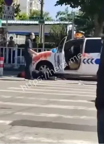 五马市场小贩割喉自杀事件